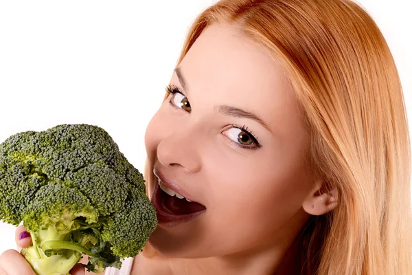 Girl biting a cabbage — Stock Photo, Image