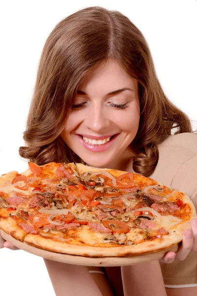 Girl looking at a pizza — Stock Photo, Image