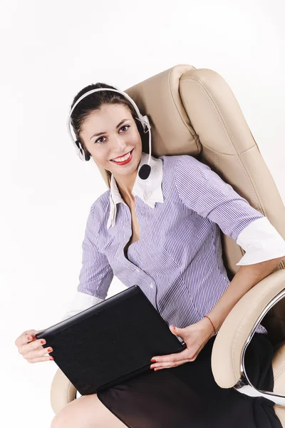 Chica en auriculares con portátil —  Fotos de Stock