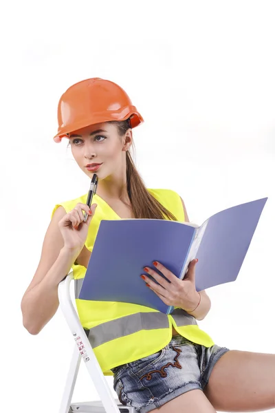 Thoughtful girl with a folder in hands — Stock Photo, Image