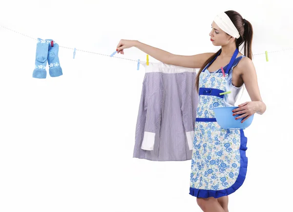 Hostess hang wet clothes — Stock Photo, Image