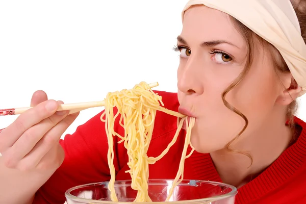 Girl eats pasta — Stock Photo, Image