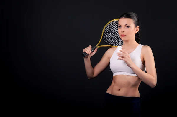 Fille avec une raquette de tennis — Photo