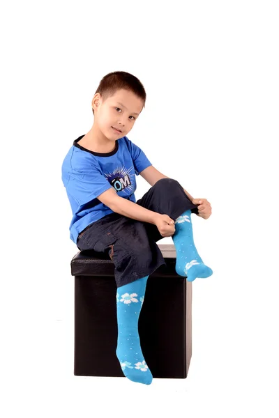 Boy wears socks — Stock Photo, Image