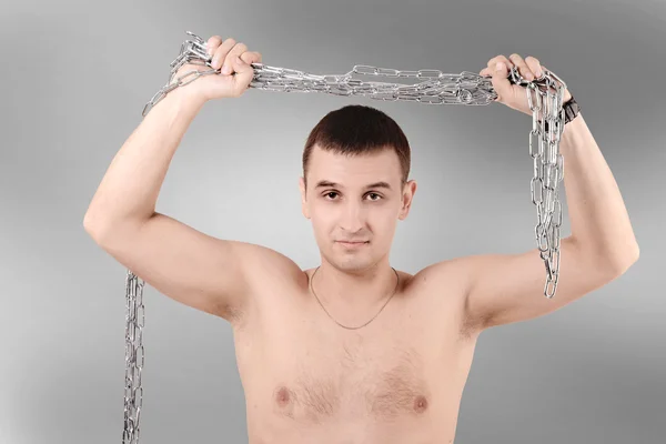 Man holding the chain — Stock Photo, Image