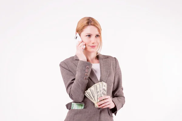 A successful woman speaks on a cellular — Stock Photo, Image