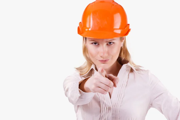 Chica en un casco muestra el dedo — Foto de Stock