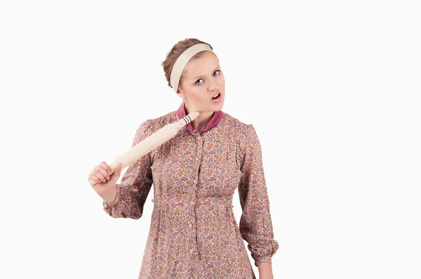 Housewife with a rolling pin, threatening someone — Stock Photo, Image