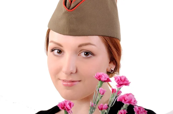 Girl in cap and studs — Stock Photo, Image