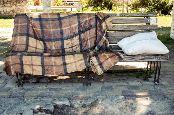 Winkel met een deken en een kussen — Stockfoto