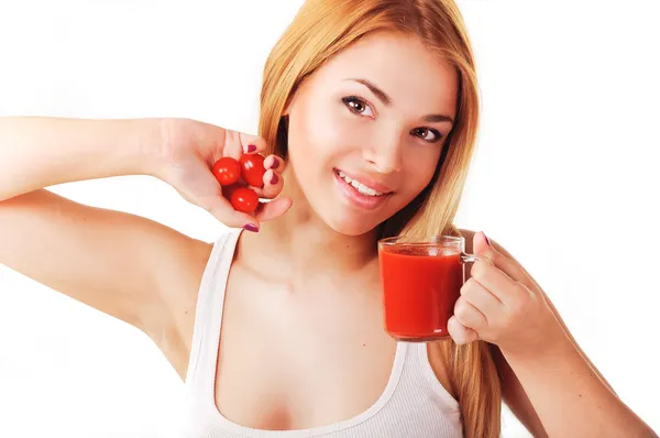 Chica con jugo de tomate y tomate — Foto de Stock