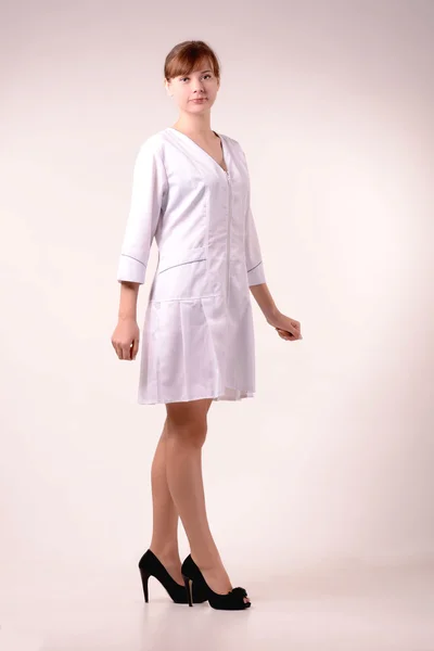 Nurse is dressed in robe — Stock Photo, Image