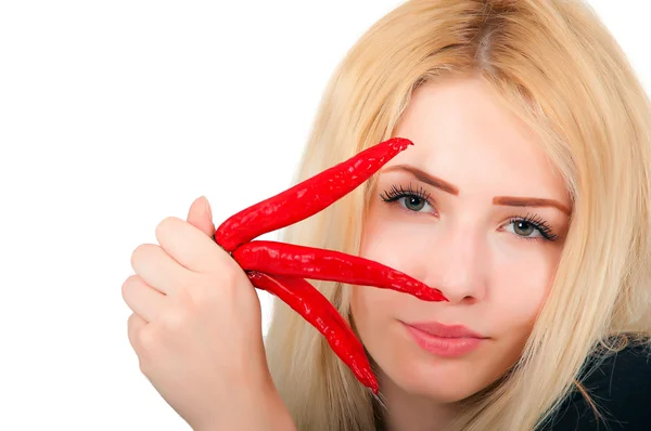 Menina segurando pimenta — Fotografia de Stock