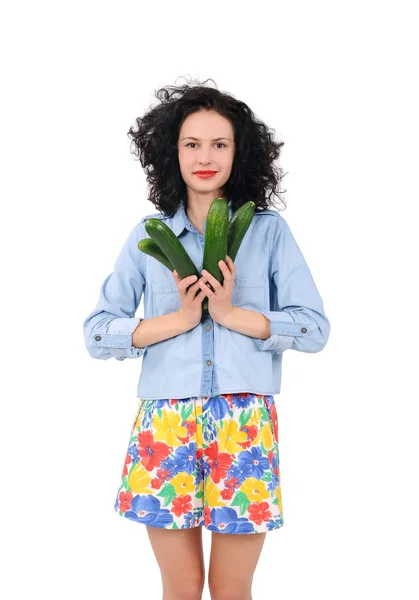 Meisje met grote komkommer — Stockfoto