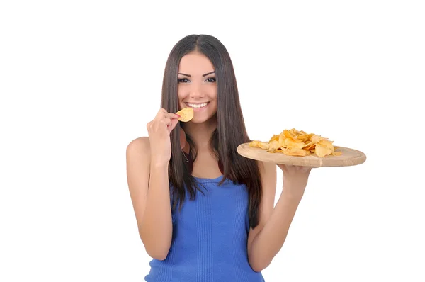 Girl tries chips — Stock Photo, Image