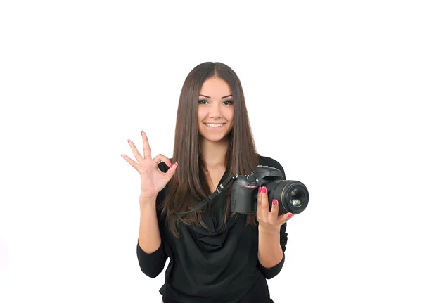 Girl with camera in hand — Stock Photo, Image