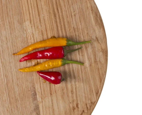 Chilli pepper on cutting board — Zdjęcie stockowe