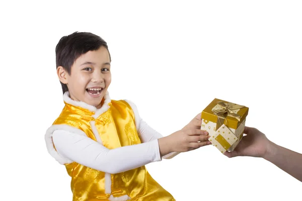 Boy and golden box — Stock Photo, Image