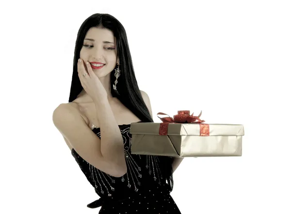 Yeni yıl Noel kız giyinmiş santa santa takım elbise esmer kız santa kosyume bir beklenmeyen bir kızdan hediye kırmızı dressa hediye hediye hediye ondan