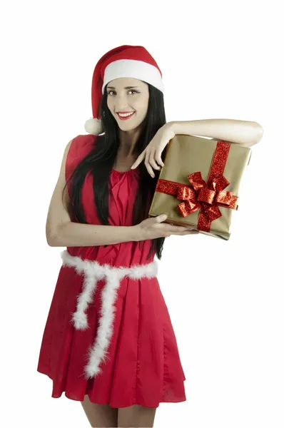 Ano Novo menina de Natal vestida como Santa santa terno morena em um presente dressa vermelho de uma menina um presente de uma menina em santa kosyume um presente inesperado um presente dela Imagens De Bancos De Imagens