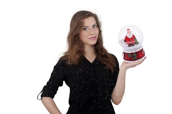 Menina segurando uma bola com Papai Noel — Fotografia de Stock