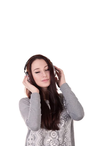 Young woman listening to music — Stock Photo, Image