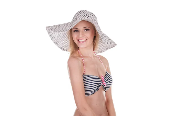 Beautiful girl in a bathing suit and hat — Stock Photo, Image