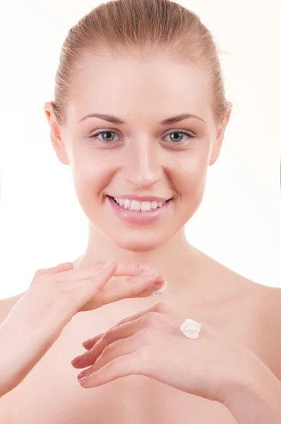 Beautiful girl enjoys hand cream — Stock Photo, Image