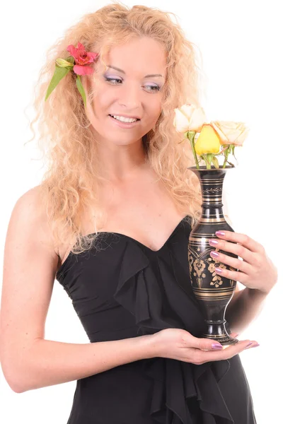 Hermosa cara de mujer con una flor — Foto de Stock