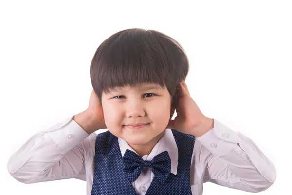 Boy covers his ears — Stock Photo, Image