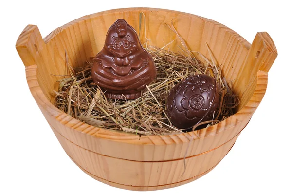 Chocolate chicken and the egg in the basket — Stock Photo, Image