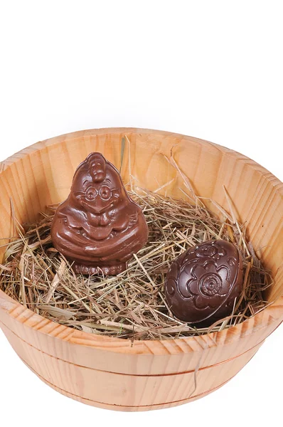 Chocolate chicken and the egg in the basket — Stock Photo, Image