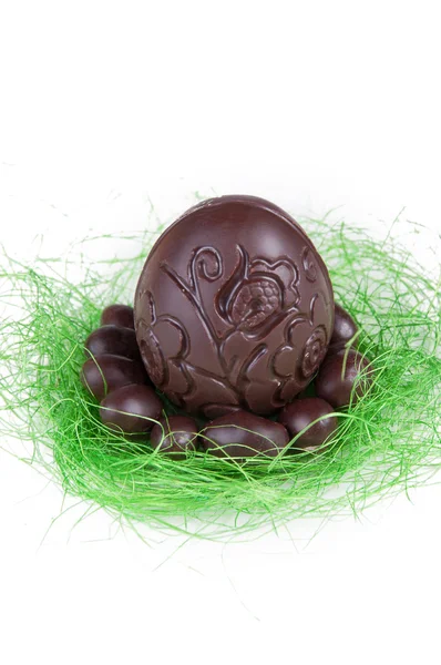 Chocolate and colored easter eggs — Stock Photo, Image