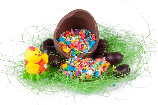 Chocolate and colored easter eggs — Stock Photo, Image