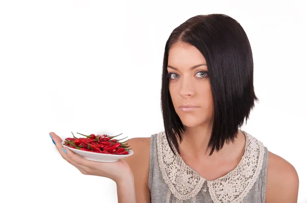 Girl holding a pepper — Stock Photo, Image