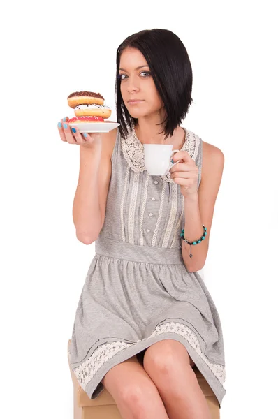 Kvinna med en donut — Stockfoto