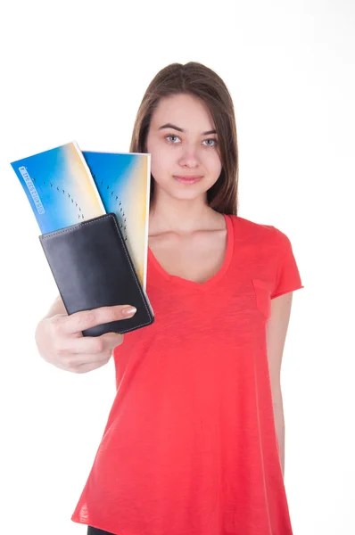 Girl holding a passport and tickets — Stock Photo, Image