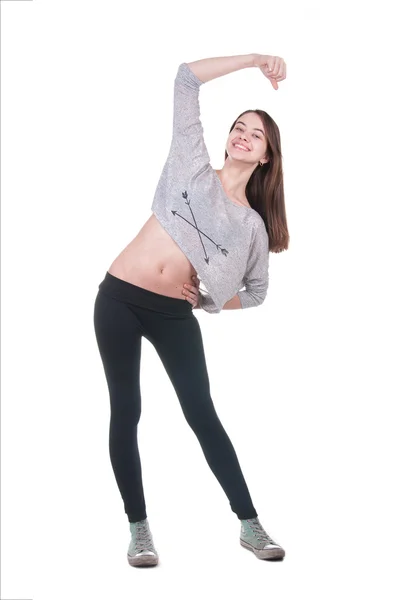 Linda chica haciendo ejercicios sobre fondo blanco — Foto de Stock