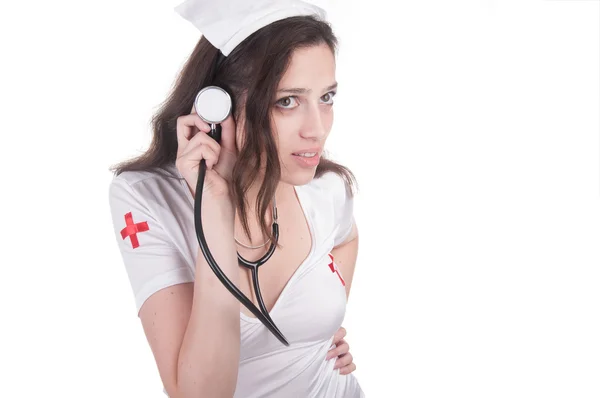 Mädchen in sexuell konventionalisiertem Anzug von Krankenschwester — Stockfoto