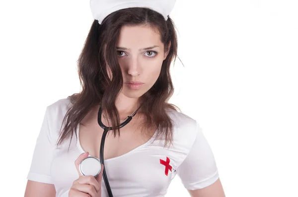 Girl in sexual conventionalized suit of medical nurse Stock Image