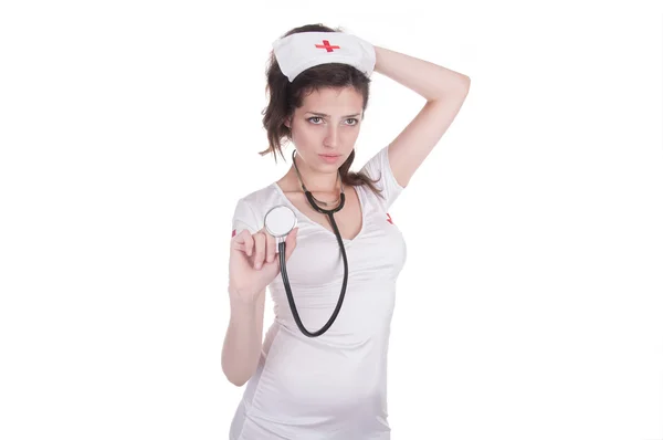 Girl in sexual conventionalized suit of medical nurse Royalty Free Stock Photos