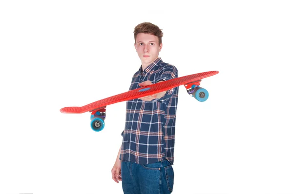 Young man holding a skateboard — Stock Photo, Image