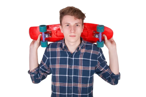 Fiatal ember tartja a gördeszka — Stock Fotó