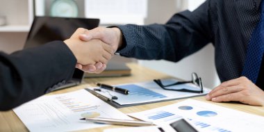 Business personage handshake, Asian business women congratulate on being a corporate partnership with European woman investors, Friendship, Sign language greetings, Successful business negotiations.