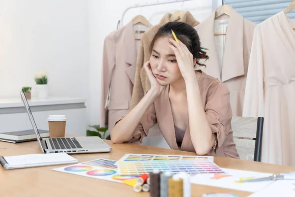 Professional designers are worried and stressed about design mistakes, Fashion designer, Creativity and ideas, Mannequin, Shirt sketch, Color scheme, Garment accessories ,work independently.