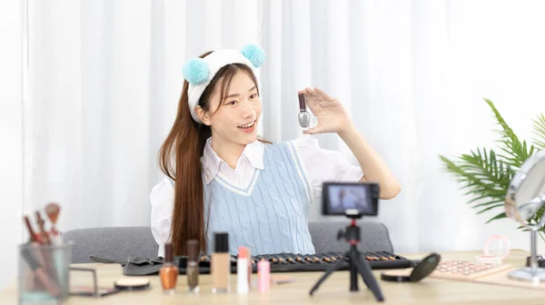 Beautiful women with social media influences recommend products and make-up accessories to be more beautiful, Recording vlog video live streaming, Online business of beauty bloggers.