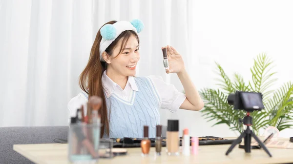 Beautiful women with social media influences recommend products and make-up accessories to be more beautiful, Recording vlog video live streaming, Online business of beauty bloggers.