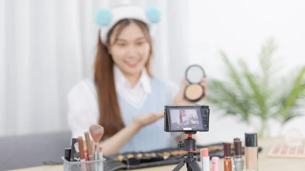 Beautiful women with social media influences recommend products and make-up accessories to be more beautiful, Recording vlog video live streaming, Online business of beauty bloggers.