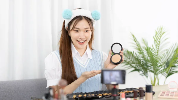 Beautiful women with social media influences recommend products and make-up accessories to be more beautiful, Recording vlog video live streaming, Online business of beauty bloggers.