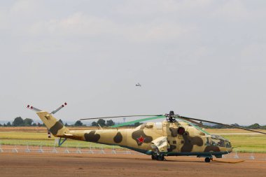 Russian Military Gunship Helicopter Parked At Airfield